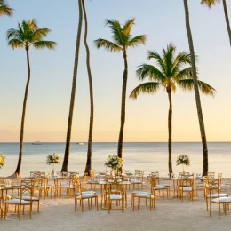 beach area venue with reception setup at Hilton La Romana