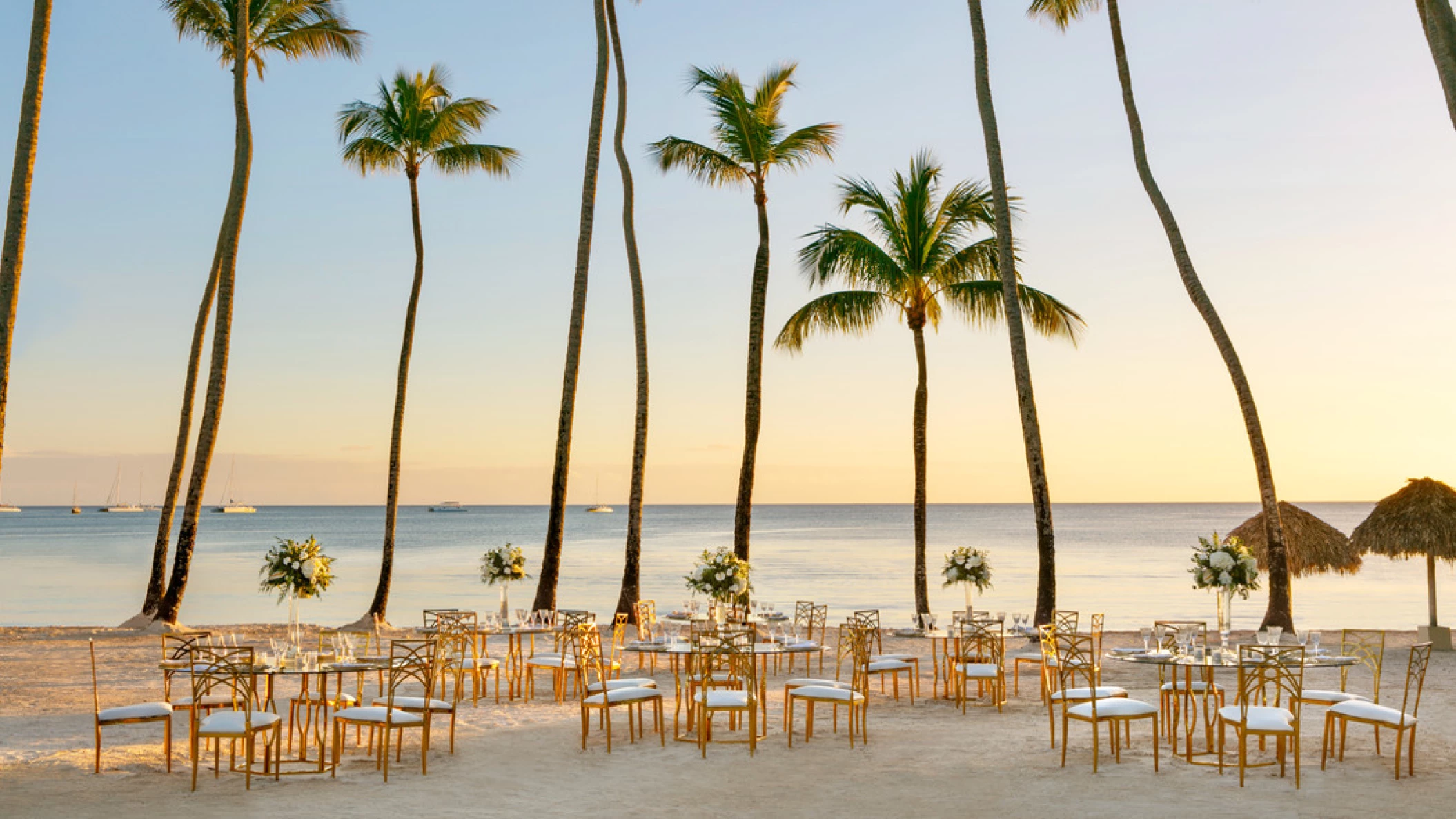 beach area venue with reception setup at Hilton La Romana