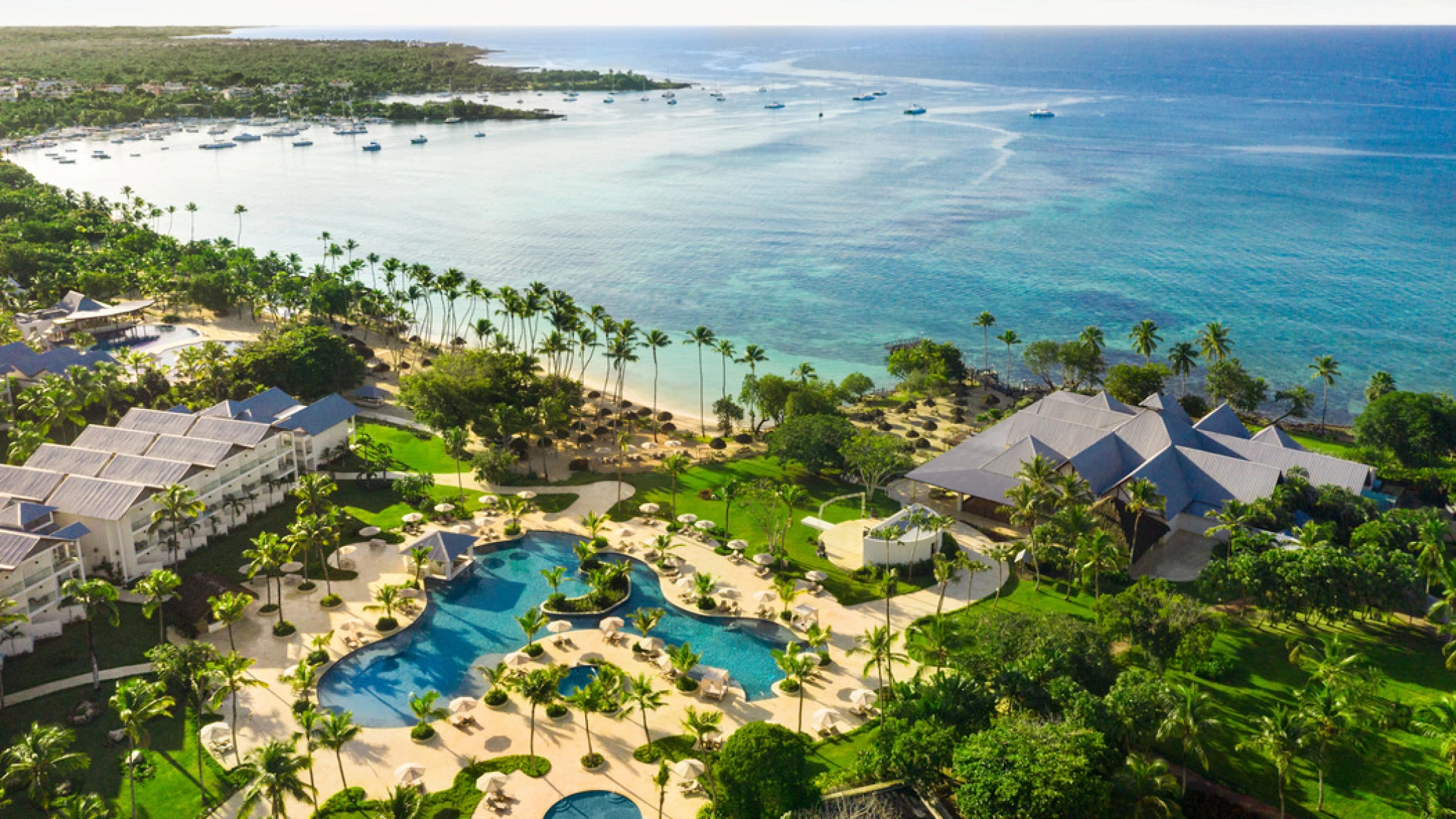 pool and beach and buildings at Hilton La Romana