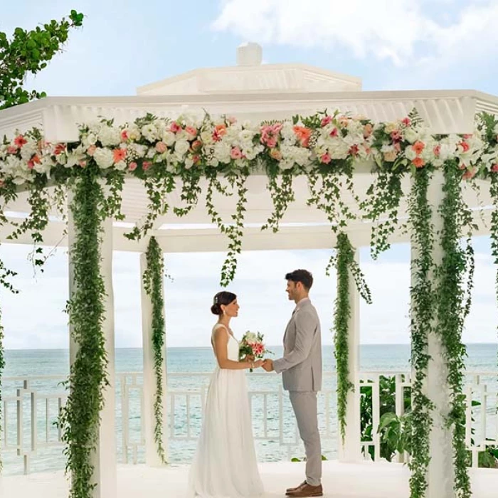 Couple on the wedding gazebo at Hilton La Romana, an All Inclusive Adult Resort