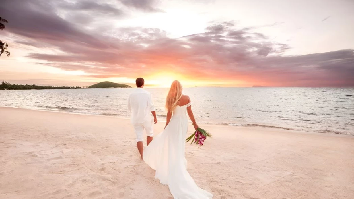 bride and groom during sunrise