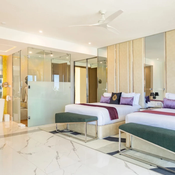 suite with two double beds at Hotel Mousai Cancun