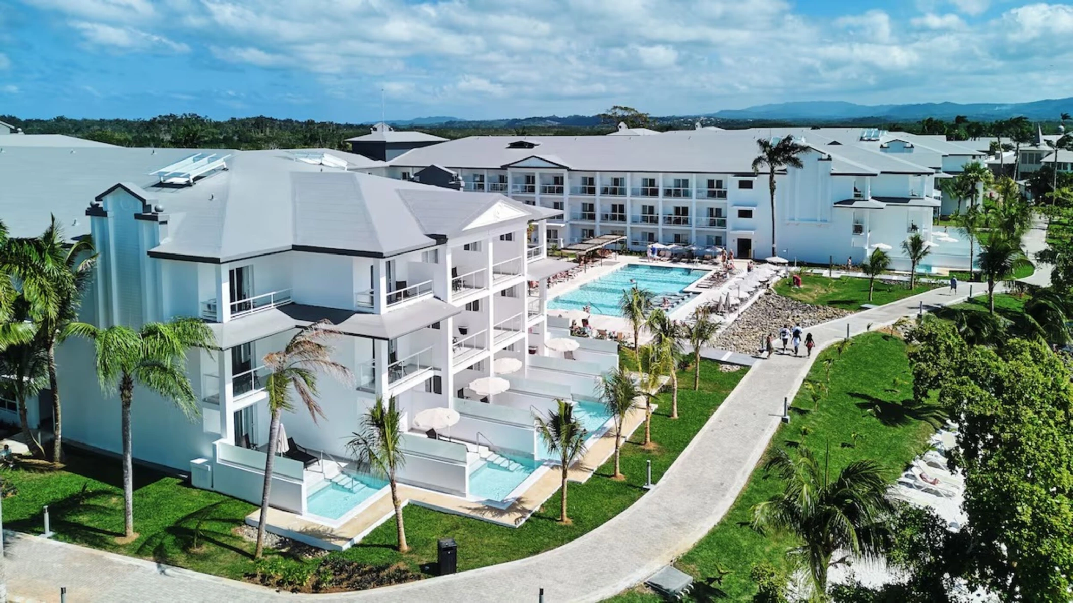 exterior view of the accommodations, swim-out suites, and gardens at Hotel Riu Negril
