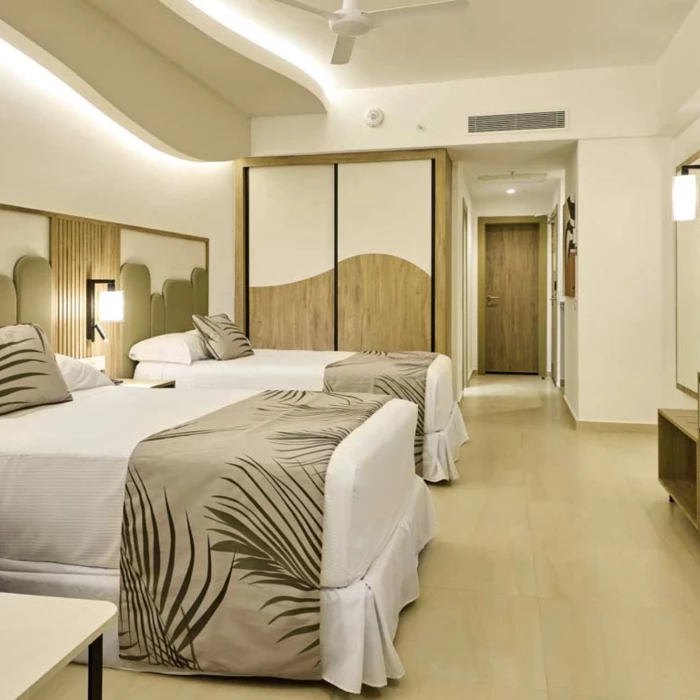 junior suite with two beds at Riu Palace Aquarelle Hotel