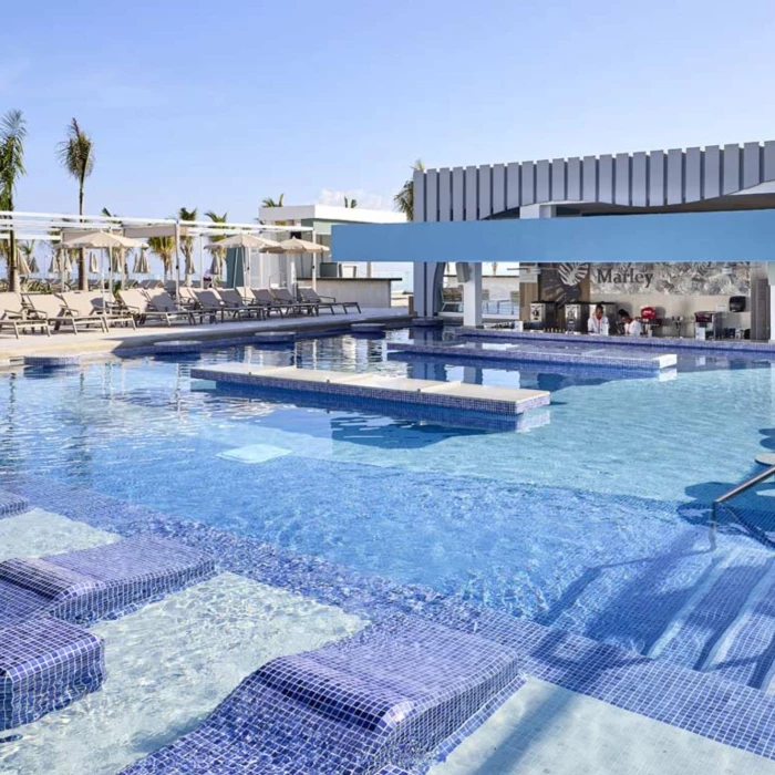 pool with swim up bar at Riu Palace Aquarelle Hotel