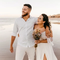 bride and groom on the beach