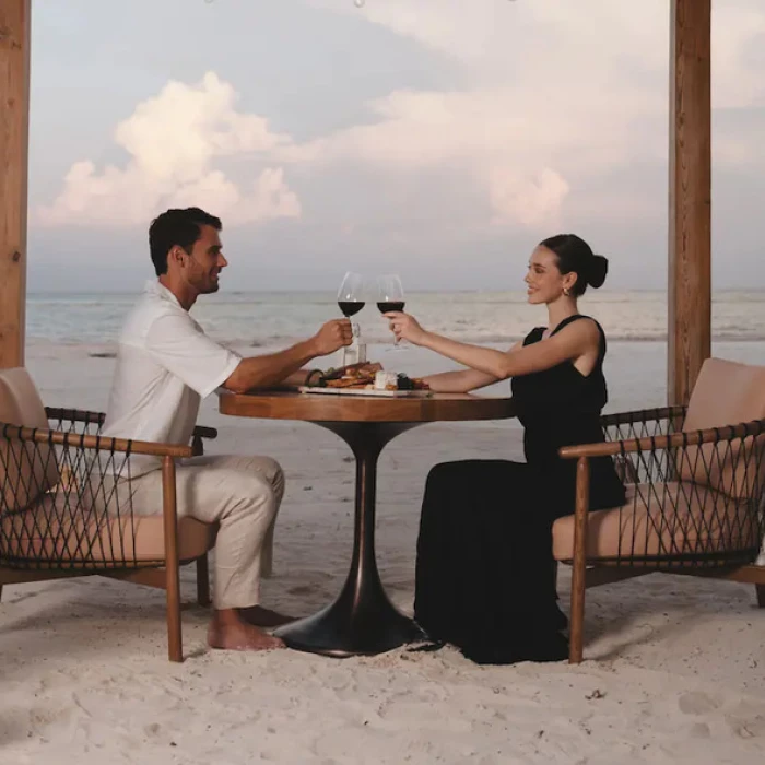 couple on the beach enjoying a romantic dinner at Hyatt Zilara Cap Cana