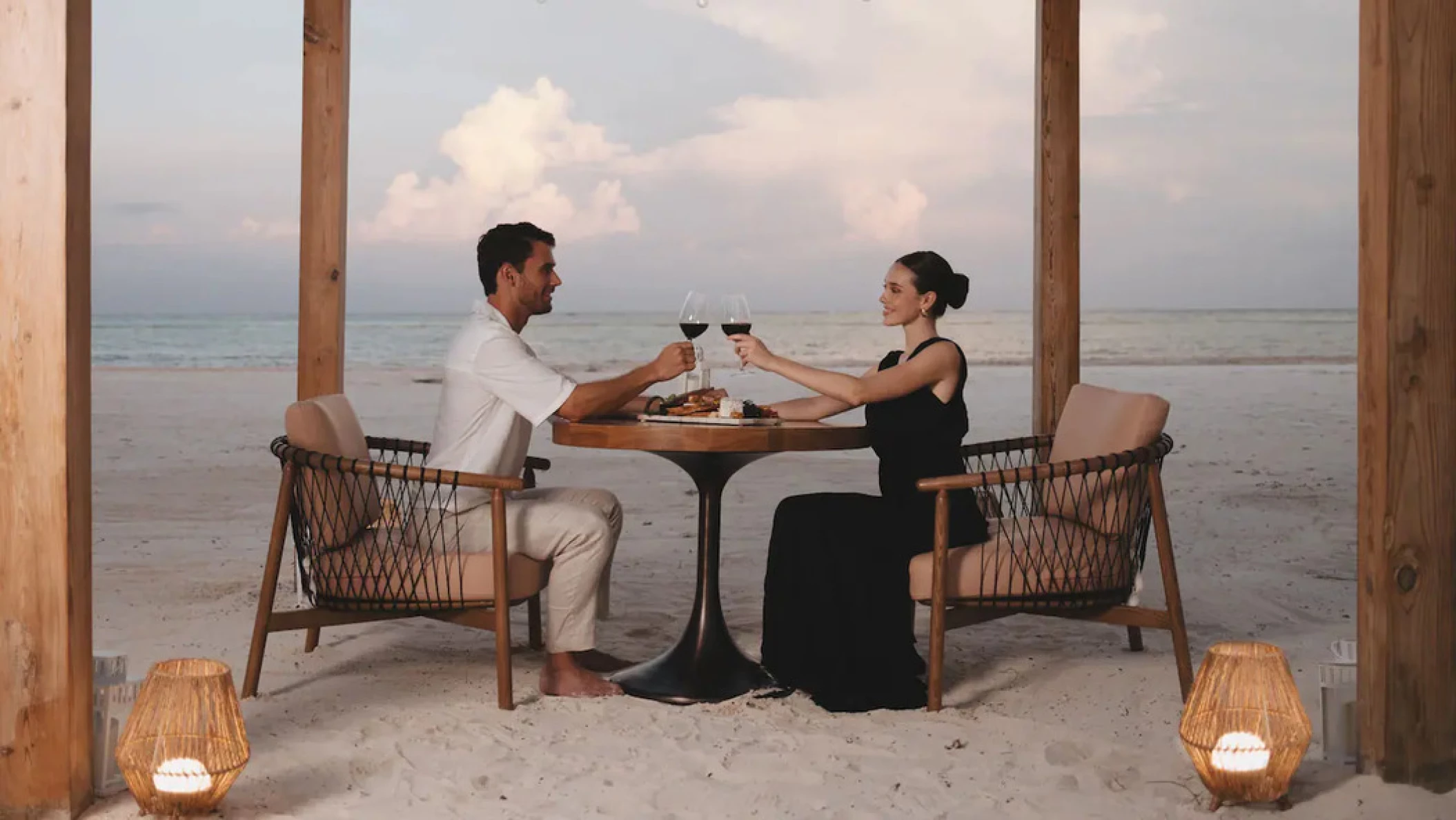 couple on the beach enjoying a romantic dinner at Hyatt Zilara Cap Cana