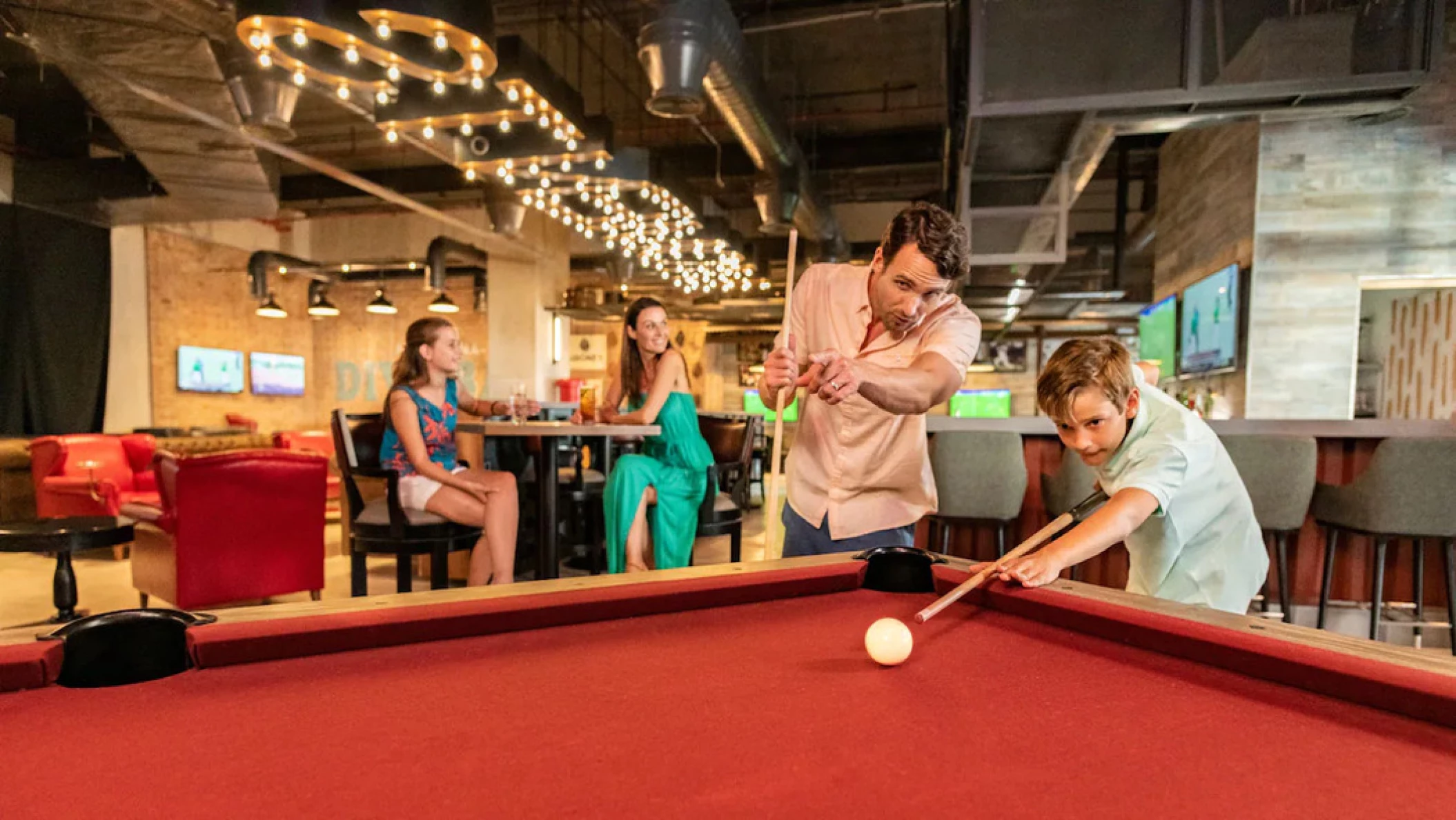 people playing pool at Hyatt Ziva Cap Cana