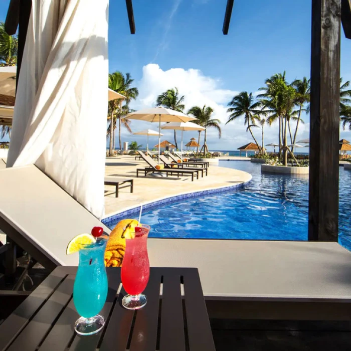 pool with loungers at Hyatt Ziva Rose Hall