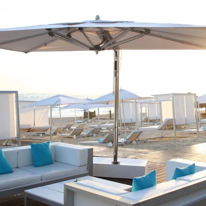 loungers and sofas on the beach at Iberostar Selection Bavaro Suites