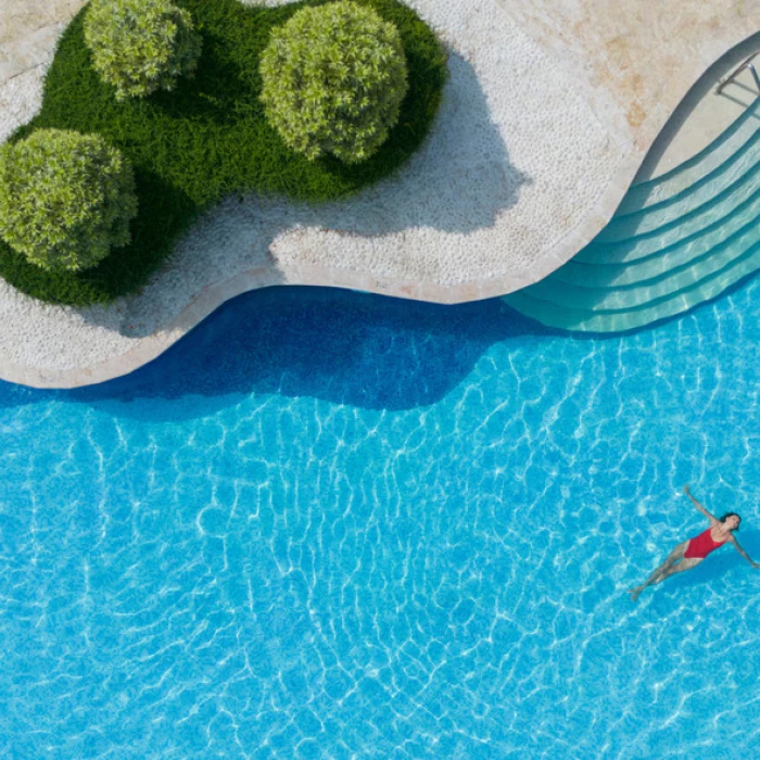 couple in the pool at Iberostar Selection Hacienda Dominicus