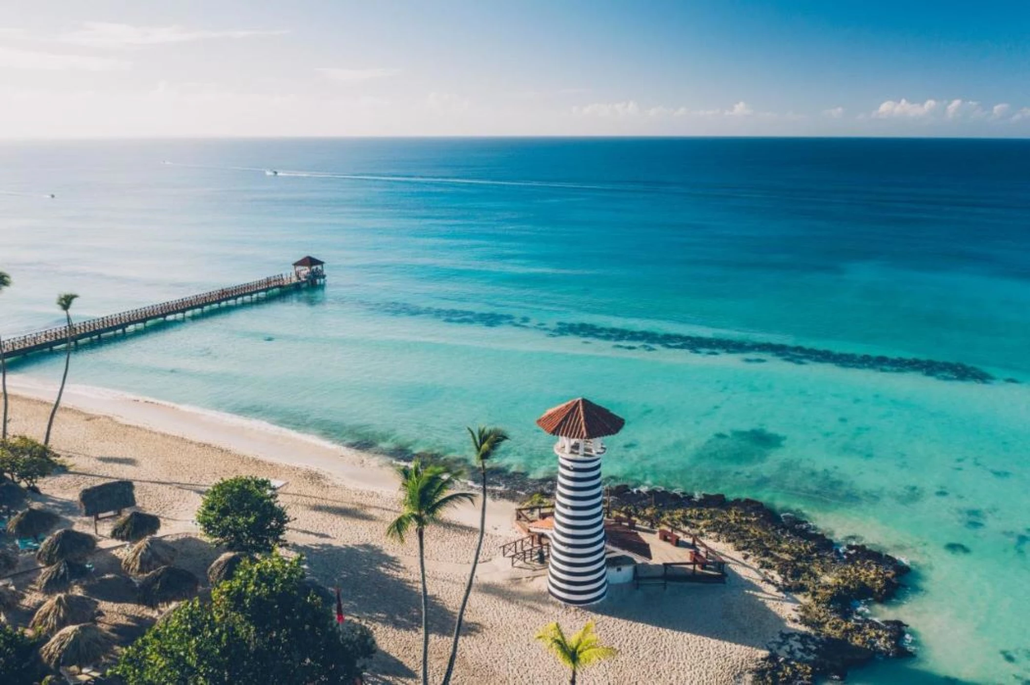 pier and lighthouse and beach at Iberostar Selection Hacienda Dominicus