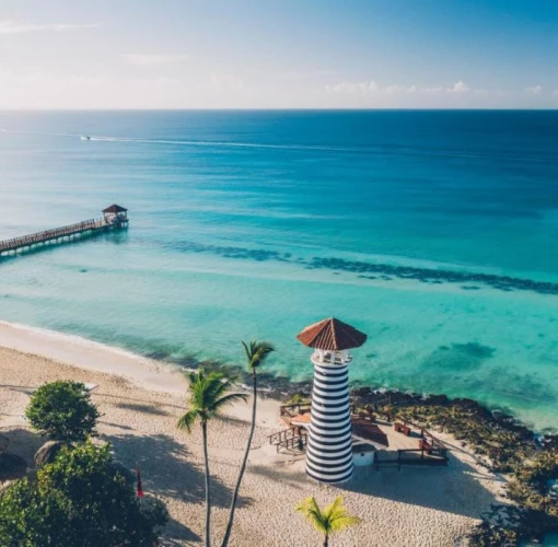 pier and lighthouse and beach at Iberostar Selection Hacienda Dominicus