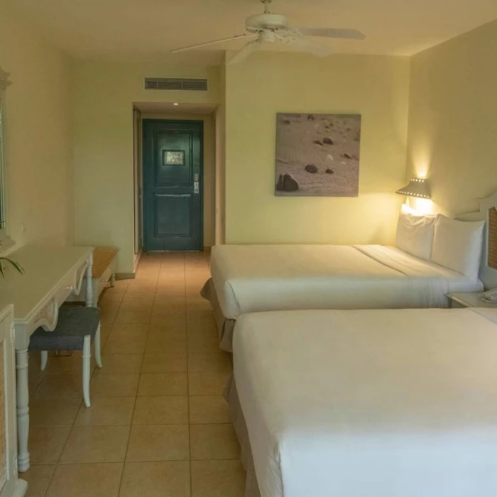 room with two beds at Iberostar Waves Costa Dorada