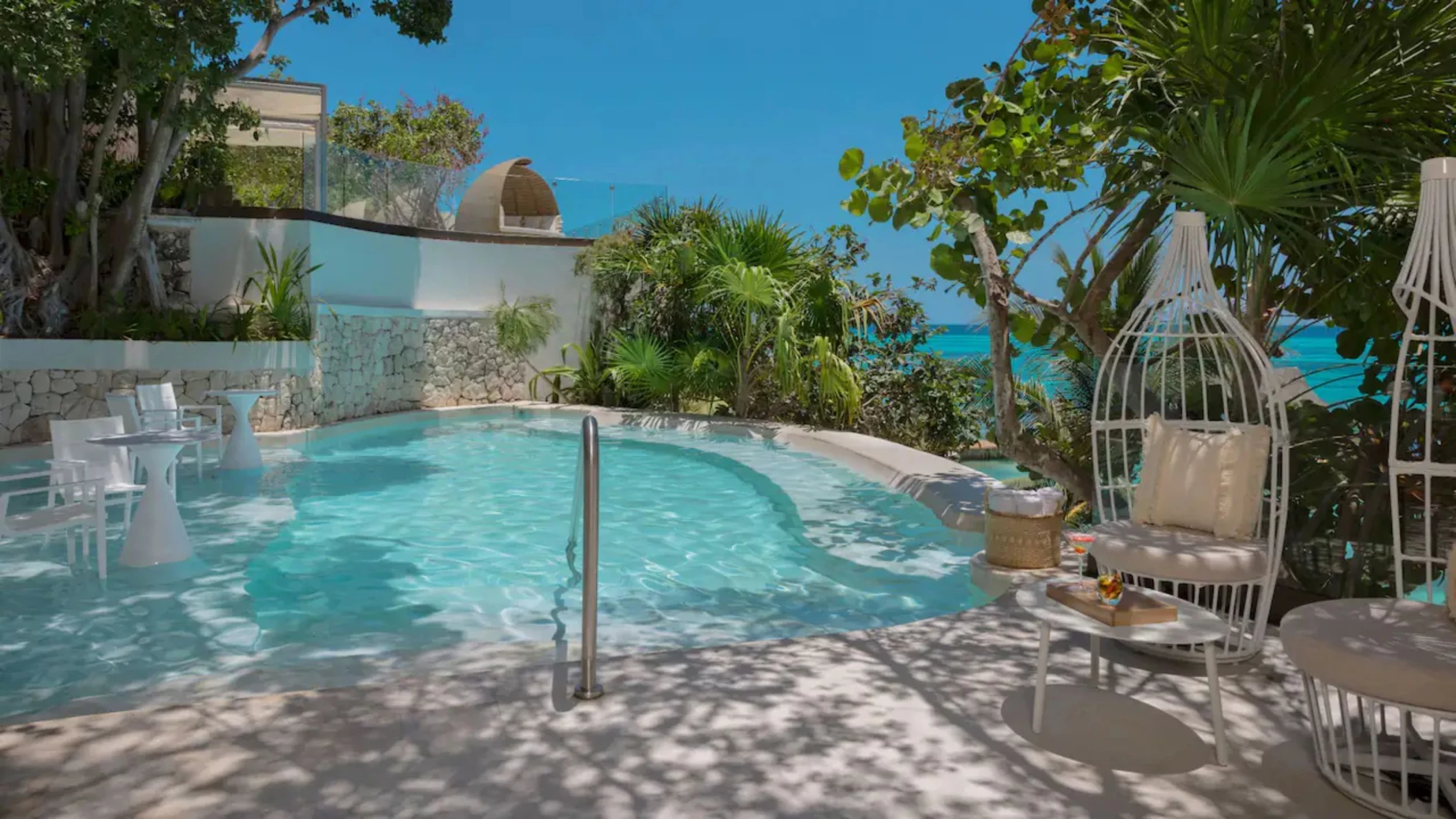 oceanfront hot tub at Impression Isla Mujeres by Secrets