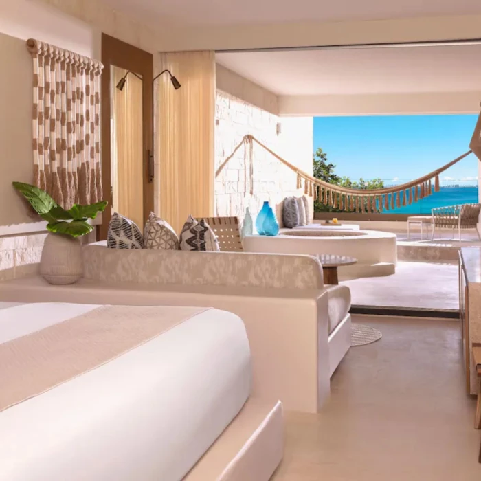 Signature Ocean View withTub suite at Impression Isla Mujeres by Secrets