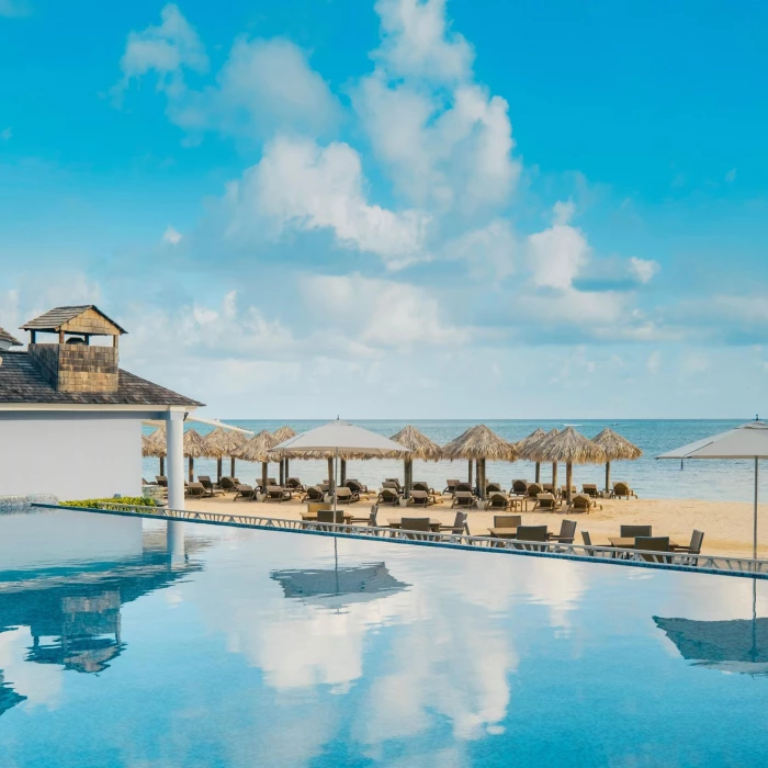 Infinity pool deck at JOIA Rose Hall by Iberostar