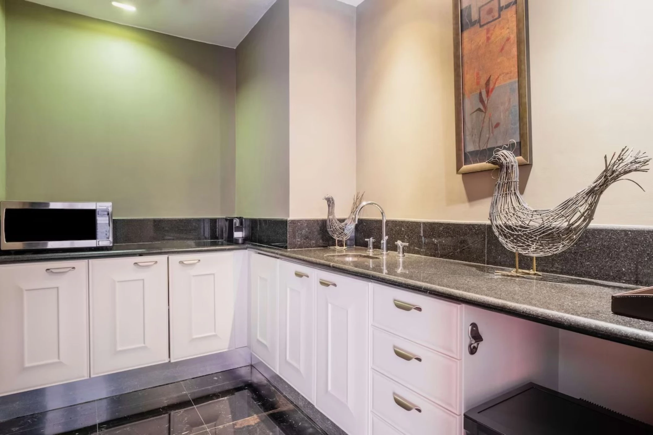 Kitchen of penthouse suite at JOIA Rose Hall by Iberostar