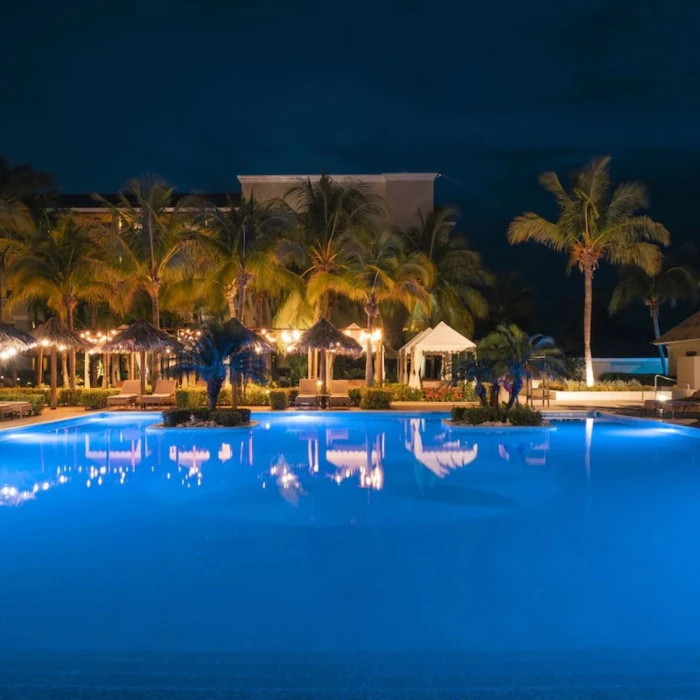 pool at night at JOIA Rose Hall by Iberostar