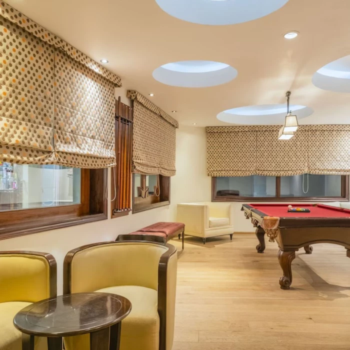 Pool table and lounge at JOIA Rose Hall by Iberostar