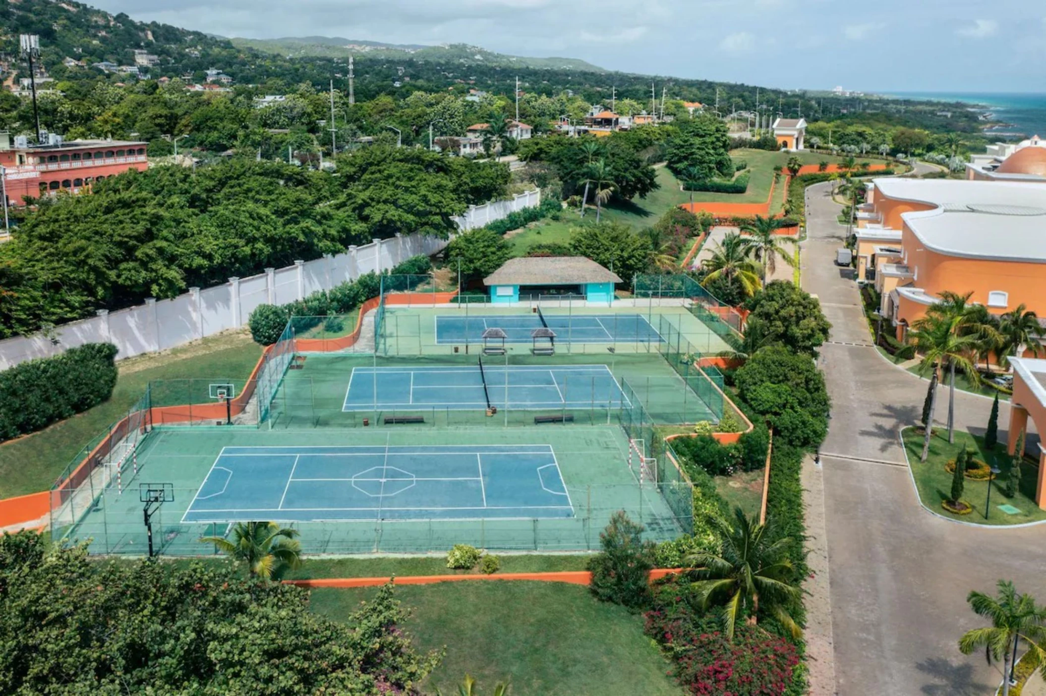 Tennis courts at JOIA Rose Hall by Iberostar