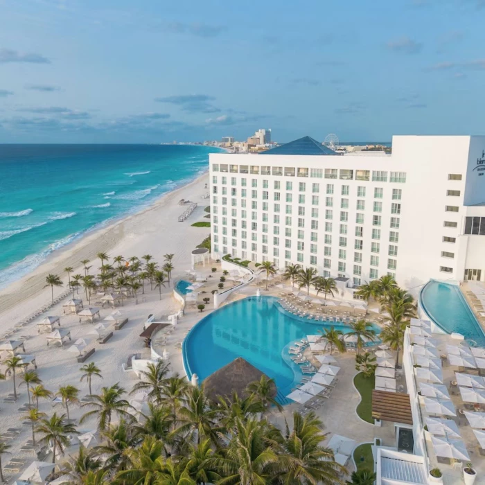 aerial view of Le Blanc Spa Resort Cancun with its accommodations, pools, and beach