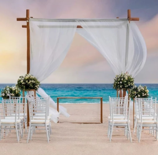 beach wedding setup at Le Blanc Spa Resort Cancun
