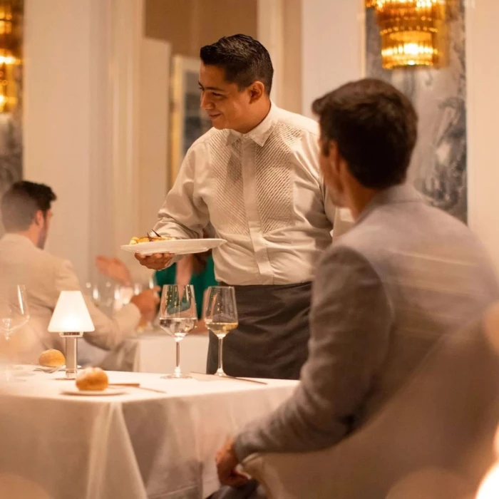 couple enjoying a meal at Le Blanc Spa Resort Cancun
