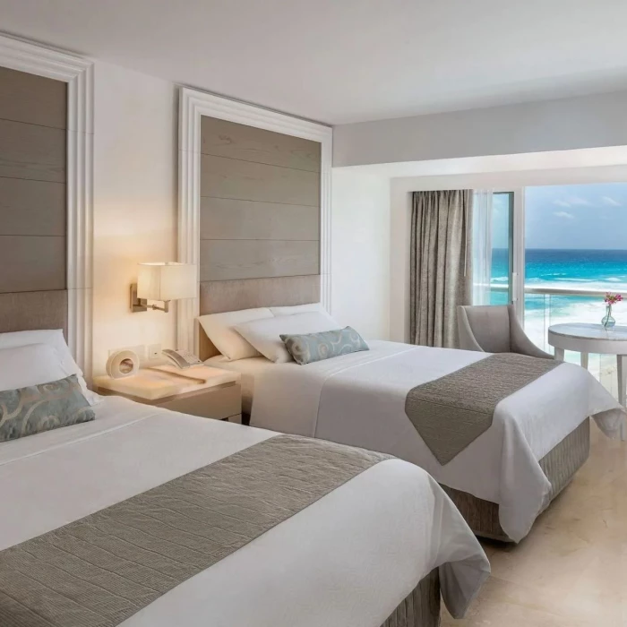 royale deluxe suite with two beds at Le Blanc Spa Resort Cancun