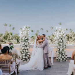 bride groom and guests at the rooftop venue at Lopesan Costa Bavaro Resort