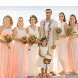 bride groom and bridesmaids and flower girl at Margaritaville Beach Resort Playa Flamingo