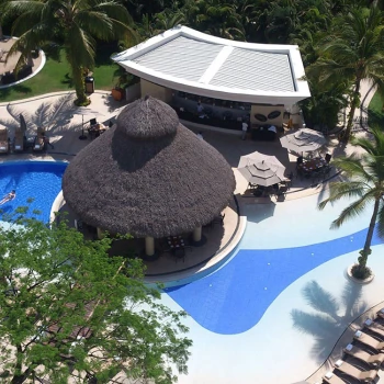 Lemongrass pool bar overview at Marival Distinct Luxury residences.