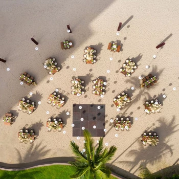Reception decor drone shot on the Beach Wedding Venue at Marriott Puerto Vallarta