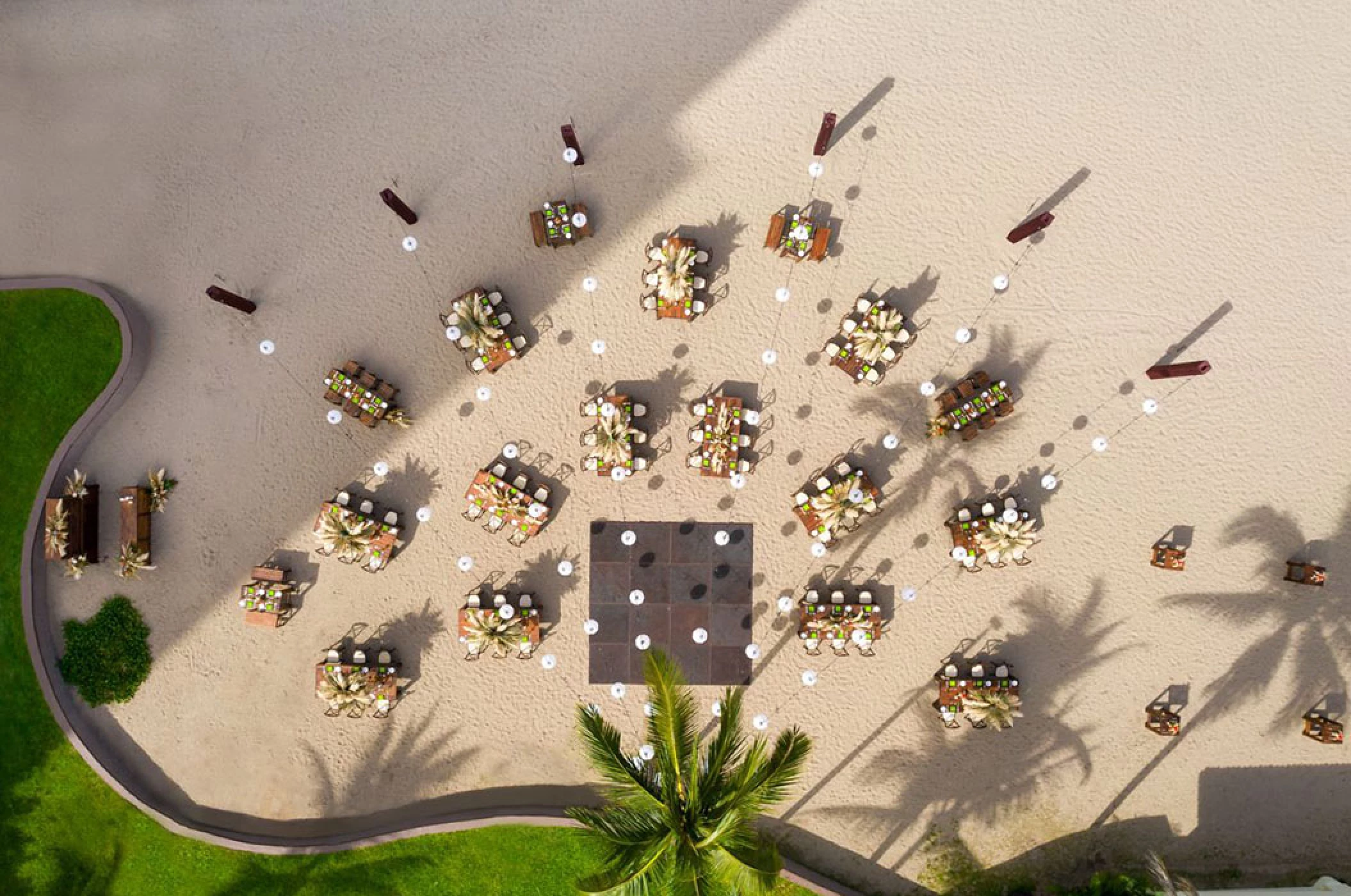 Reception decor drone shot on the Beach Wedding Venue at Marriott Puerto Vallarta