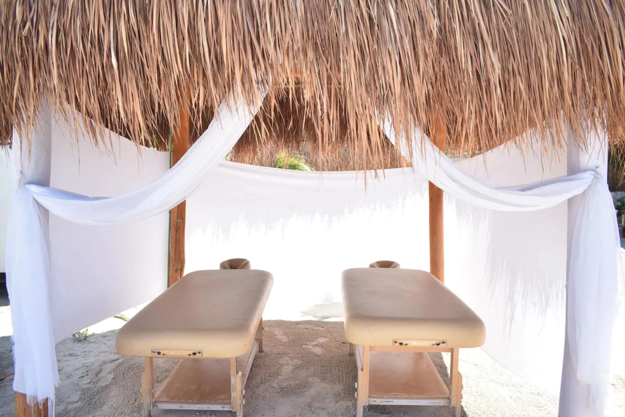 massage tables on the beach at Mystique Holbox by Royalton