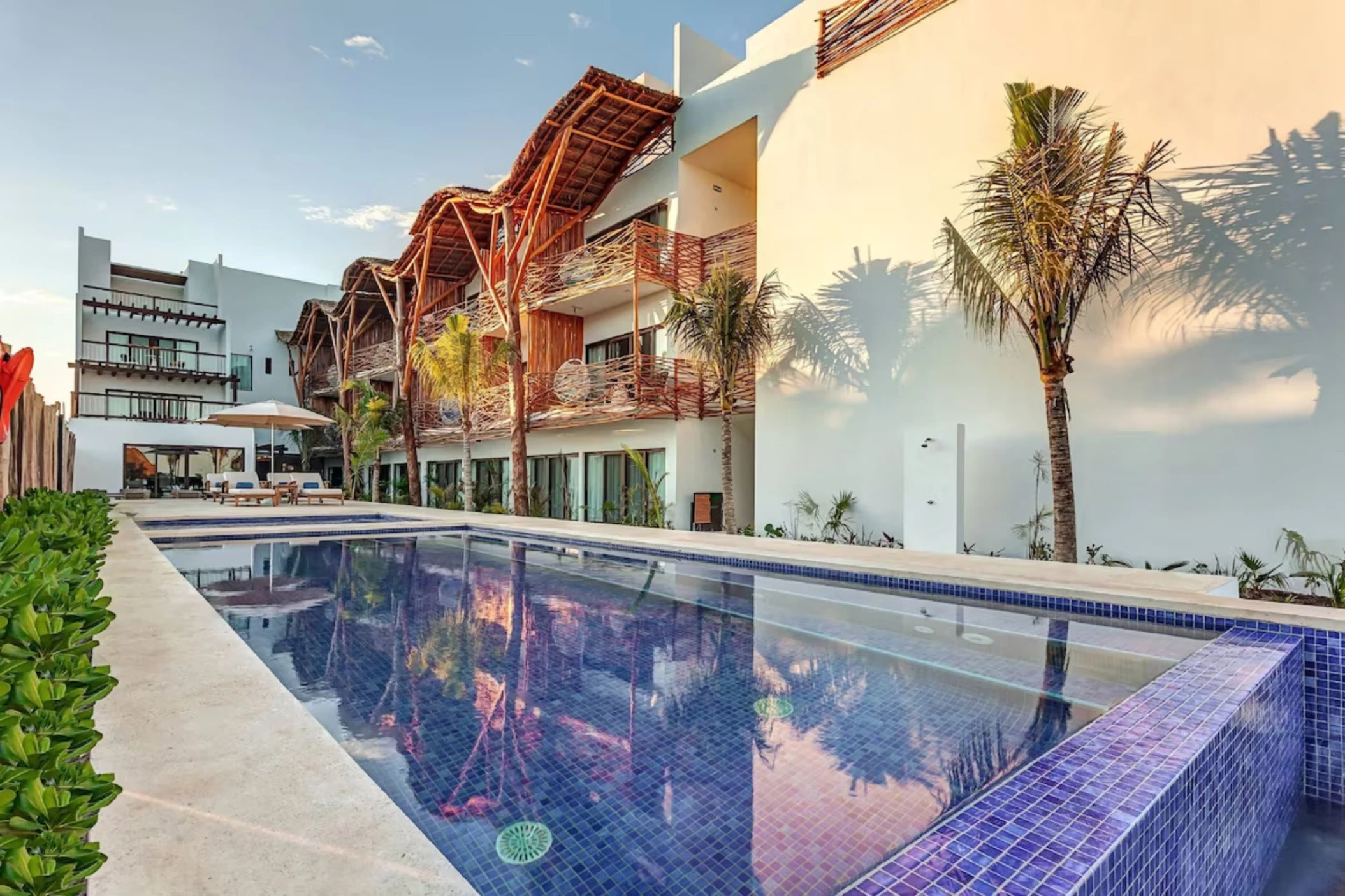 pool and accommodations at Mystique Holbox by Royalton