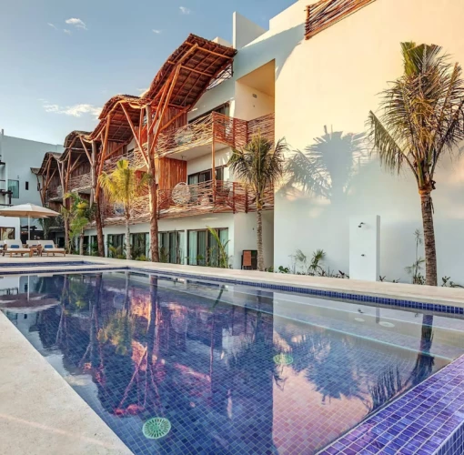 pool and accommodations at Mystique Holbox by Royalton