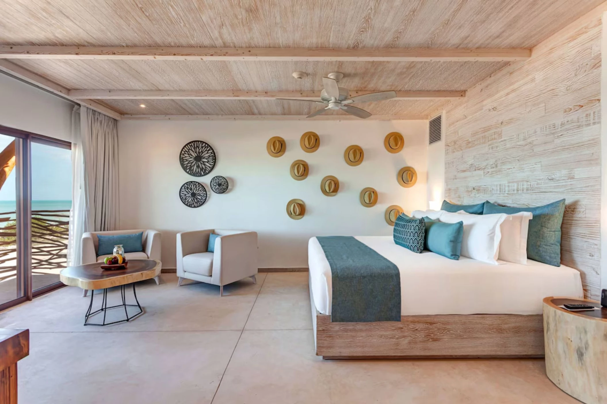 suite with king bed at Mystique Holbox by Royalton