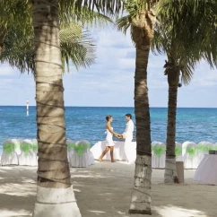 bride and groom on the beach at Occidental Costa Cancun