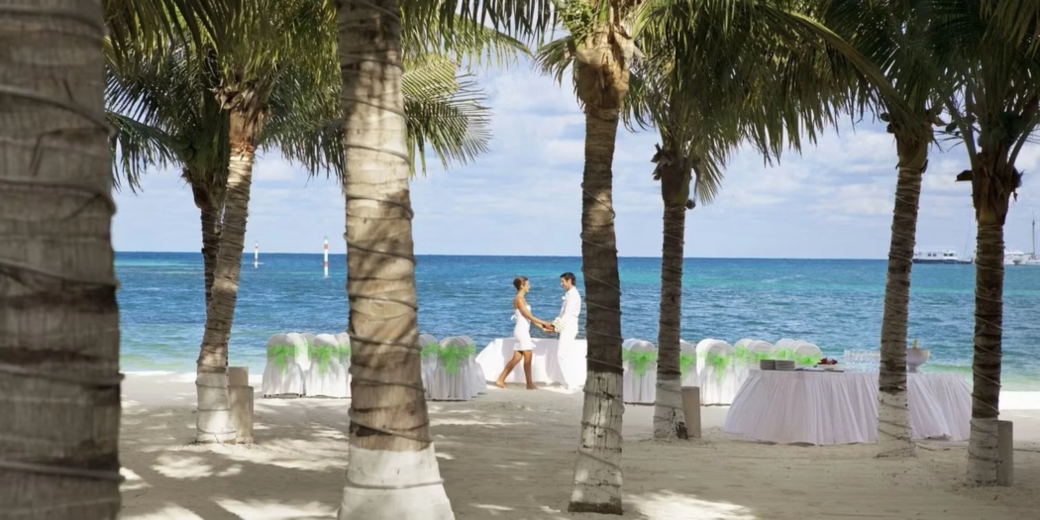 bride and groom on the beach at Occidental Costa Cancun