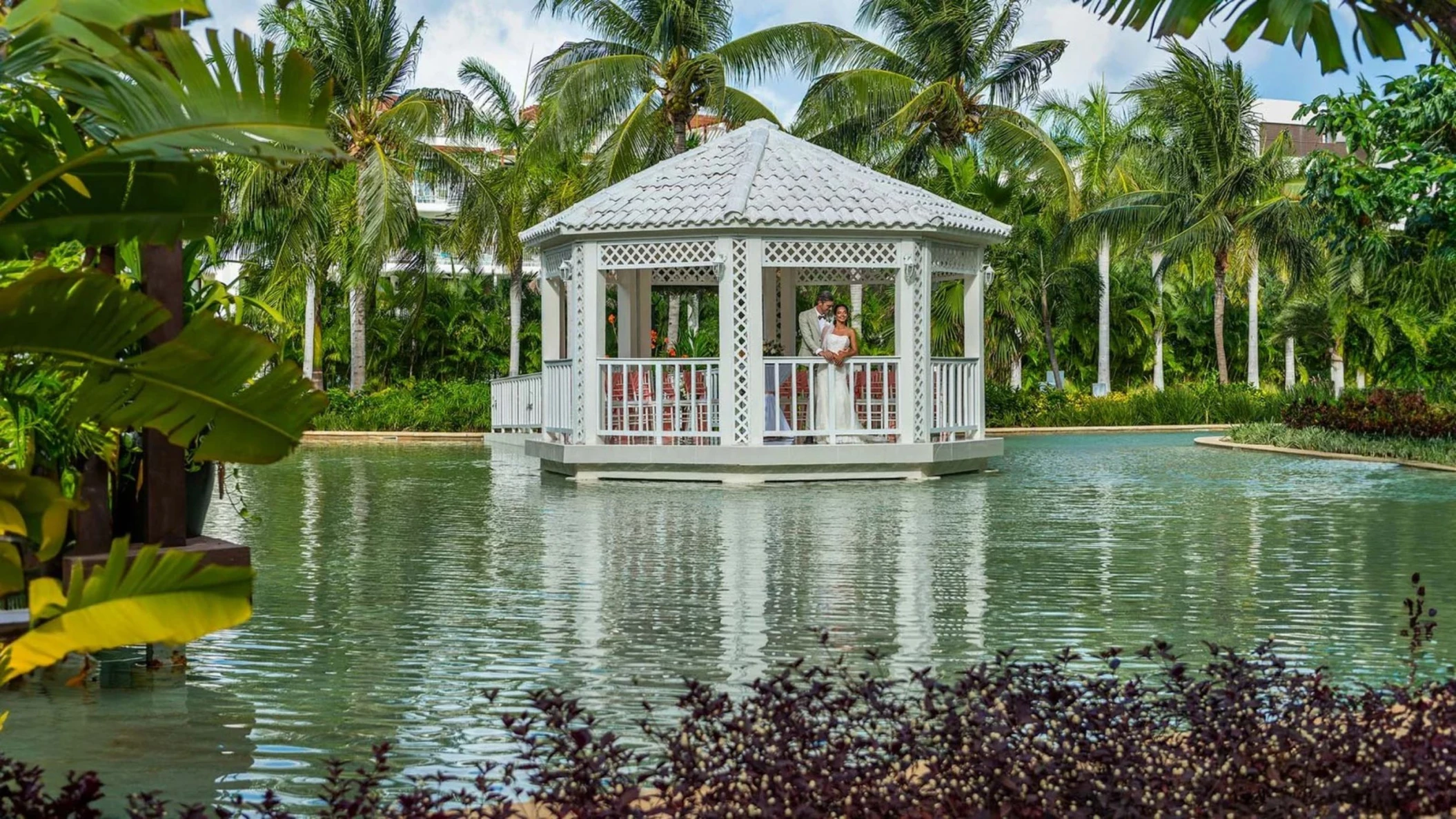 bride and groom at the gazebo venue at Ocean Allure Costa Mujeres