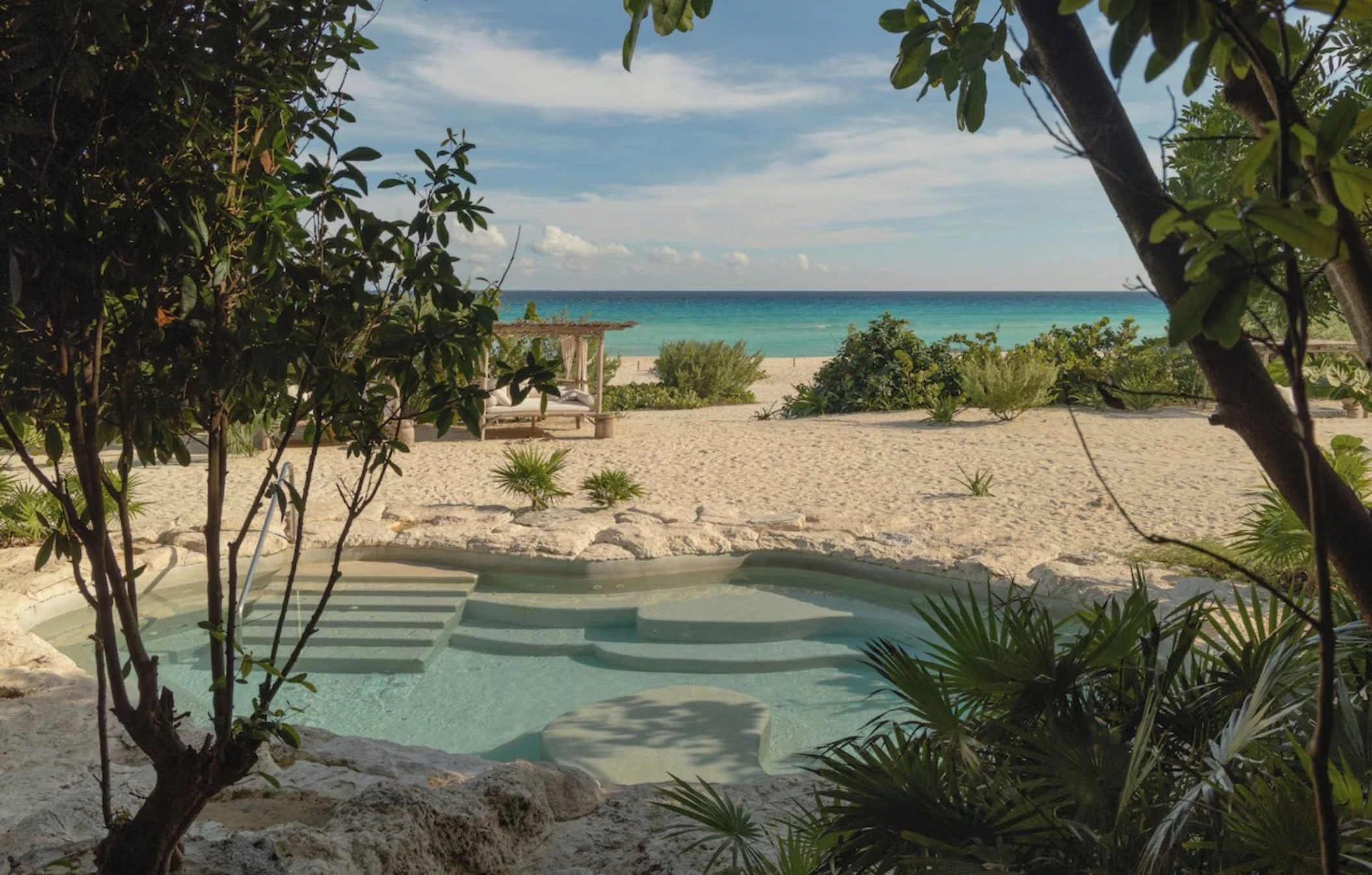 outdoor pool on the beach at Palmaia - The House of AiA