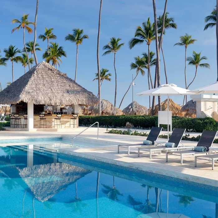 pool bar and loungers at Paradisus Palma Real