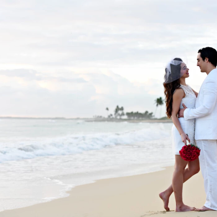 bride and groom on the beach at Royalton CHIC Punta Cana