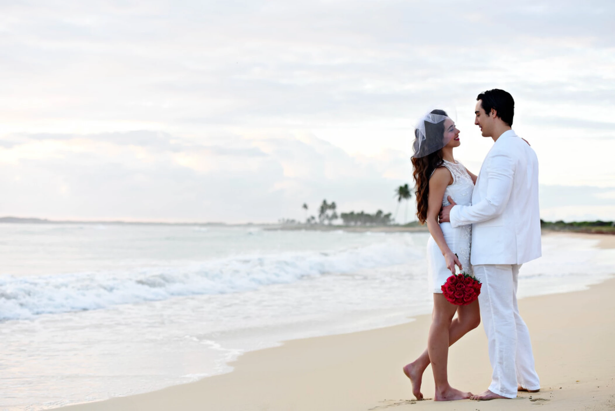 bride and groom on the beach at Royalton CHIC Punta Cana