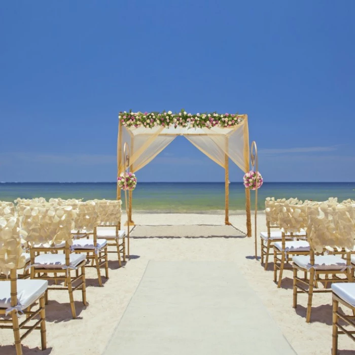 Beach ceremony setup at Royalton Riviera Cancun Resort.