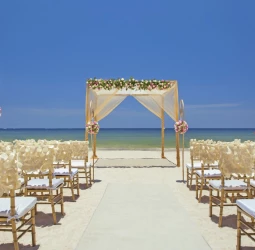 Beach ceremony setup at Royalton Riviera Cancun Resort.