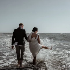 bride and groom on the beach