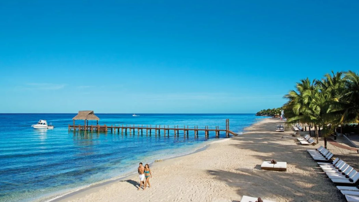 couple on the beach at Secrets Aura Cozumel